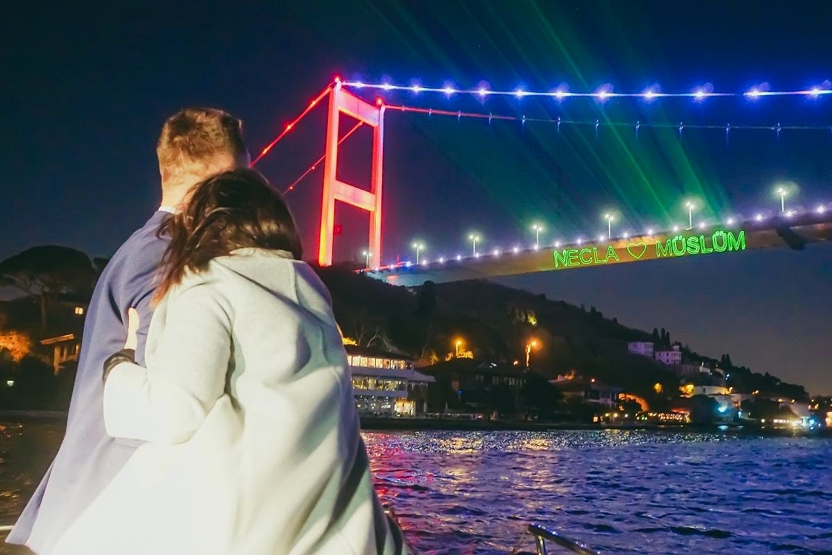 Laser show under the bridge - Lotus Yachts